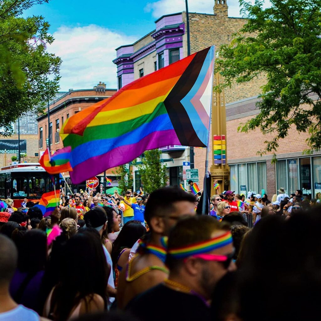 progressive pride flag in a pride parade